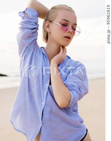 Outdoor fashion portrait summer beach style of Outdoor fashion portrait summer beach style of 95962819