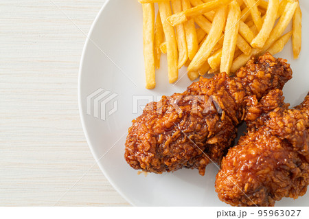 spicy Korean fried chicken with fries 95963027
