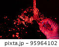 Broken test tubes with blood 95964102
