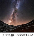 Milky Way and Starry Sky in the Mountains. Milky way galaxy. Long exposure photograph.With grain. 95964112