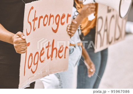 Protest, sign and equality with a group of people holding cardboard during a rally or march for freedom. Street, community and justice with a crowd fighting for human rights or a politics campaign Protest, sign and equality with a group of people holding cardboard during a rally or march for freedom. Street, community and justice with a crowd fighting for human rights or a politics campaign 95967086
