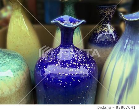Collection of colorful beautiful ceramic vases. 95967641
