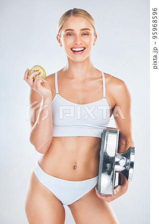 Wellness, body and lose weight diet portrait of woman with nutrition snack marketing and smile. White studio mockup of happy model with healthy figure for nutritionist product advertising. 95968596
