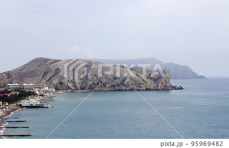 Cape Alchak-Kaya, Sudak, Crimea. Picturesque place in Sudak, mountains and sea. 95969482