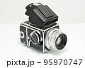 Vintage analog medium format camera with a pentaprism viewer 95970747