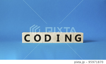 Coding symbol. Concept word Coding on wooden cubes. Beautiful blue background. Business and Coding concept. Copy space. Coding symbol. Concept word Coding on wooden cubes. Beautiful blue background. Business and Coding concept. Copy space. 95971870