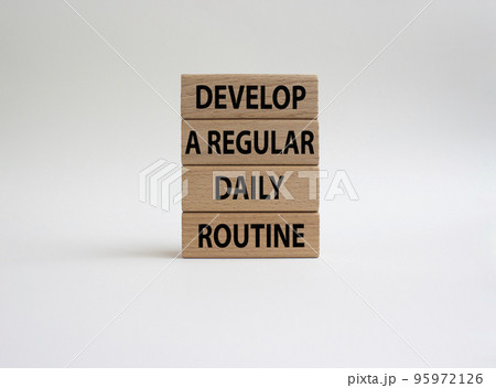 Develop a regular daily routine symbol. Concept words Develop a regular daily routine on wooden blocks. Beautiful white background. Business and Develop a regular daily routineconcept. Copy space. Develop a regular daily routine symbol. Concept words Develop a regular daily routine on wooden blocks. Beautiful white background. Business and Develop a regular daily routineconcept. Copy space. 95972126