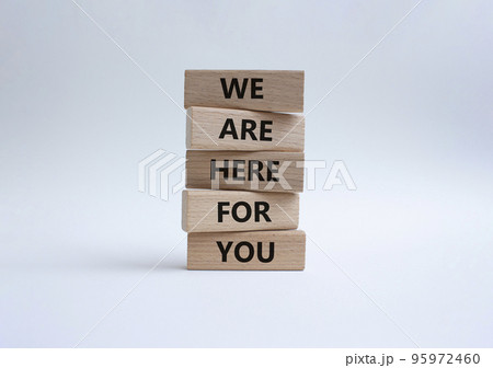 Help symbol. Wooden blocks with words 'We are here for you'. Beautiful white background. Business and 'We are here for you' concept. Copy space. 95972460