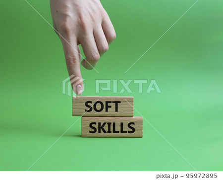 Soft skills symbol. Wooden blocks with words Soft skills. Beautiful green background. Businessman hand. Business and Soft skills concept. Copy space. Soft skills symbol. Wooden blocks with words Soft skills. Beautiful green background. Businessman hand. Business and Soft skills concept. Copy space. 95972895