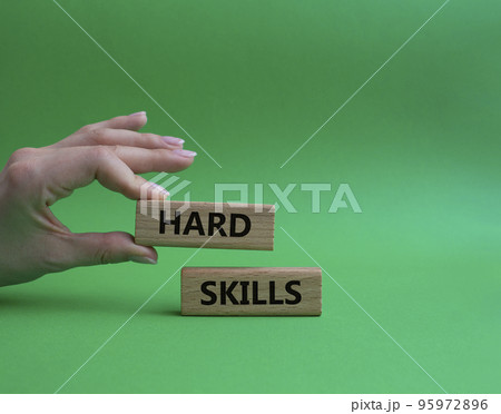 Hard skills symbol. Wooden blocks with words Hard skills. Beautiful green background. Businessman hand. Business and Hard skills concept. Copy space. Hard skills symbol. Wooden blocks with words Hard skills. Beautiful green background. Businessman hand. Business and Hard skills concept. Copy space. 95972896