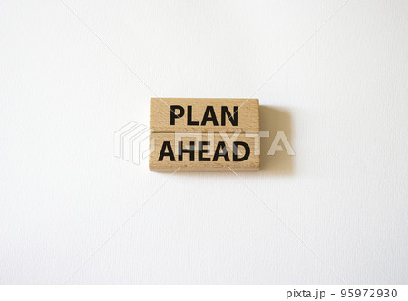 Plan ahead symbol. Wooden blocks with words Plan ahead. Beautiful white background. Business and 'Plan ahead' concept. Copy space. 95972930