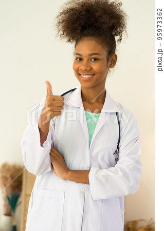 Portrait young woman doctor happy smiling confidence proud positive 95973362