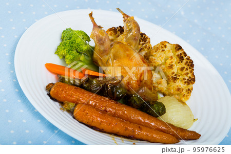 Grilled quail with baked vegetables in honey-mustard sauce Grilled quail with baked vegetables in honey-mustard sauce 95976625