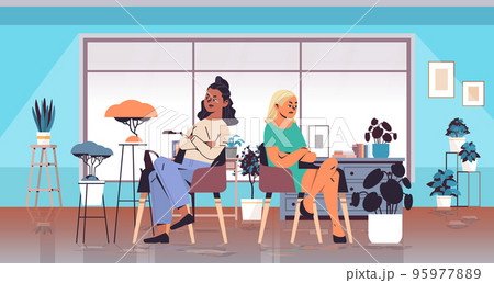 young arguing women not speaking to each other generation Z lifestyle concept young arguing women not speaking to each other generation Z lifestyle concept 95977889