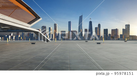 Empty concrete floor with cement structure and wooden wall building exterior 95978151