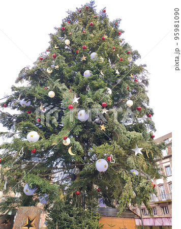 Christmas tree decorated on the Place Kleber in old town of Strasbourg at day, France 95981090