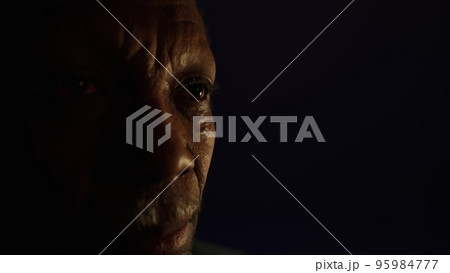 Close-up sad black male eyes 95984777