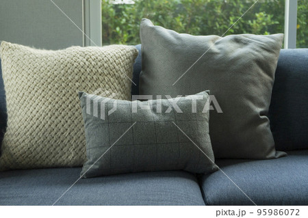 Luxurious dark blue sofa with cushions. Contemporary furniture. Luxurious dark blue sofa with cushions. Contemporary furniture. 95986072