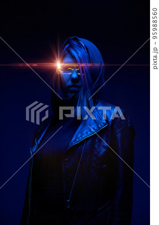 Woman is using augmented reality headset. Concept of virtual, augmented and extended reality. 95988560