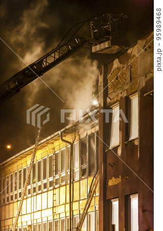 a building after the fire at night a building after the fire at night 95989468
