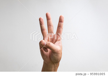 Pointing up with fingers number three. 95991005