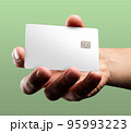 Man's hand holding credit card. 95993223