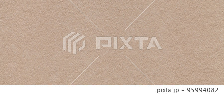 Texture of old dark beige color paper background, macro. Structure of a vintage craft brown cardboard . 95994082