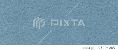 Texture of old light blue color paper background, macro. Structure of a vintage craft denim cardboard. Texture of old light blue color paper background, macro. Structure of a vintage craft denim cardboard. 95994085