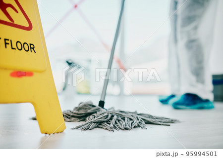As clean as floors should be. Shot of a healthcare worker a wearing hazmat suit and sanitising a room during an outbreak. As clean as floors should be. Shot of a healthcare worker a wearing hazmat suit and sanitising a room during an outbreak. 95994501