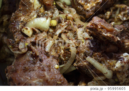 pickled meat with onions for frying shish kebab close up 95995605