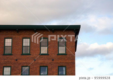 old building windows downtown city vintage architecture red brick condominium 95999928