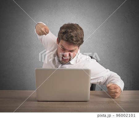 Stressed and overworked businessman Stressed and overworked businessman 96002101