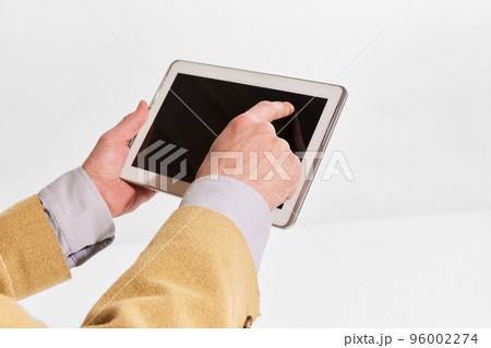 Image of male hands typing on table isolated over white background. Information search, online business, remote control 96002274