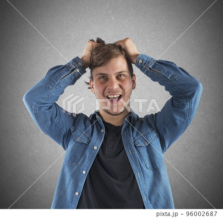 Boy shouting desperately 96002687