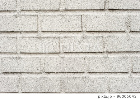 rough White painted brick wall for a background rough White painted brick wall for a background 96005045