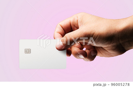 Man's hand holding credit card. Man's hand holding credit card. 96005278