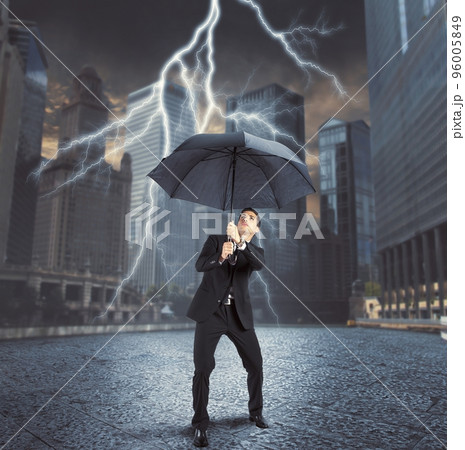 Businessman against lightning Businessman against lightning 96005849
