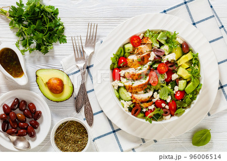 Mediterranean grilled Chicken Salad in white bowl 96006514