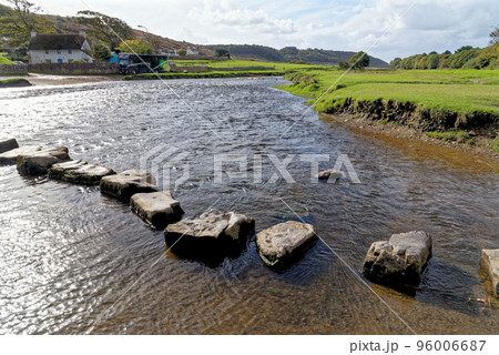 Old stepping stones to cross Ewenny River at Ogmore Castle 96006687