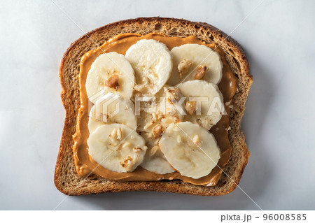 Healthy open sandwich with peanut butter 96008585