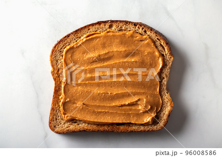 Healthy open sandwich with peanut butter 96008586