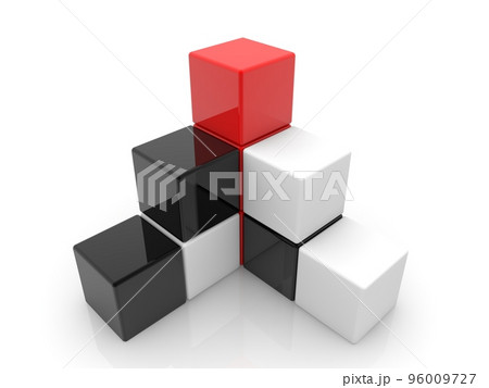 Abstract black and white pyramid of toy blocks with a red block at the top 96009727