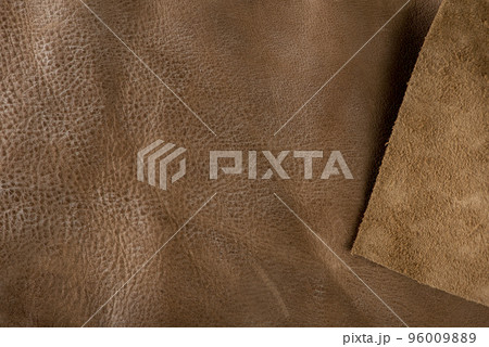 Texture of brown leather. Texture of natural brown leather. Background for design or project 96009889