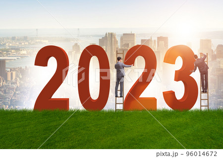 Concept of new year of 2023 with business people Concept of new year of 2023 with business people 96014672