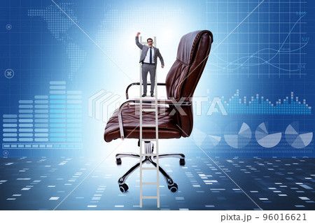 Businessman in the career concept climbing chair 96016621