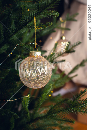 Decorated Christmas tree with balls and garland. Front view. Vertical photo. Decorated Christmas tree with balls and garland. Front view. Vertical photo. 96020046