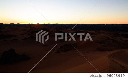 Sunset view to Tin Merzouga dune at Tassili nAjjer national park in Algeria Sunset view to Tin Merzouga dune at Tassili nAjjer national park in Algeria 96023919