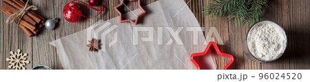 banner of christmas background for baking gingerbread cookies with cutters and spices. Empty cooking paper for holiday recipe. banner of christmas background for baking gingerbread cookies with cutters and spices. Empty cooking paper for holiday recipe. 96024520