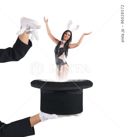 Woman bunny magically comes out of hat 96026572