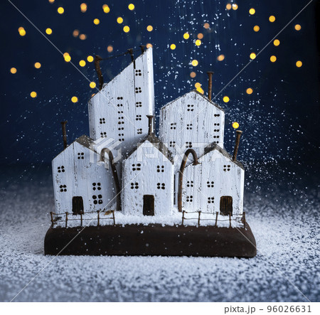 winter christmas composition night city in the snow, wooden houses from driftwood winter christmas composition night city in the snow, wooden houses from driftwood 96026631